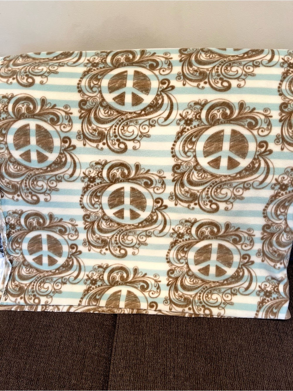 Cozy Peace Symbol Fleece Fabric - Aqua Blue & Brown